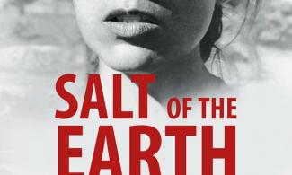 Movie poster for the film "Salt of the Earth", featuring the face of a Chicana woman above a mass of picketing women